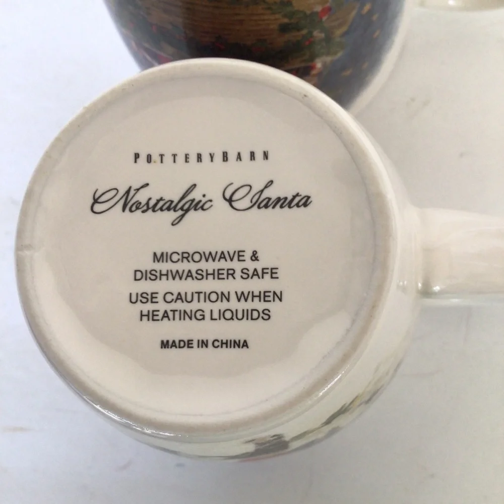 POTTERY BARN SET OF TWO NOSTALGIC SANTA MUGS
